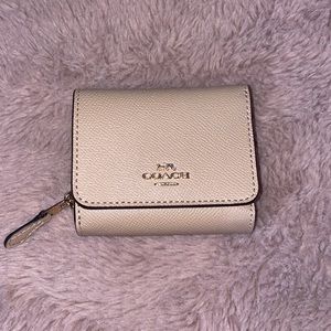 coach trifold wallet